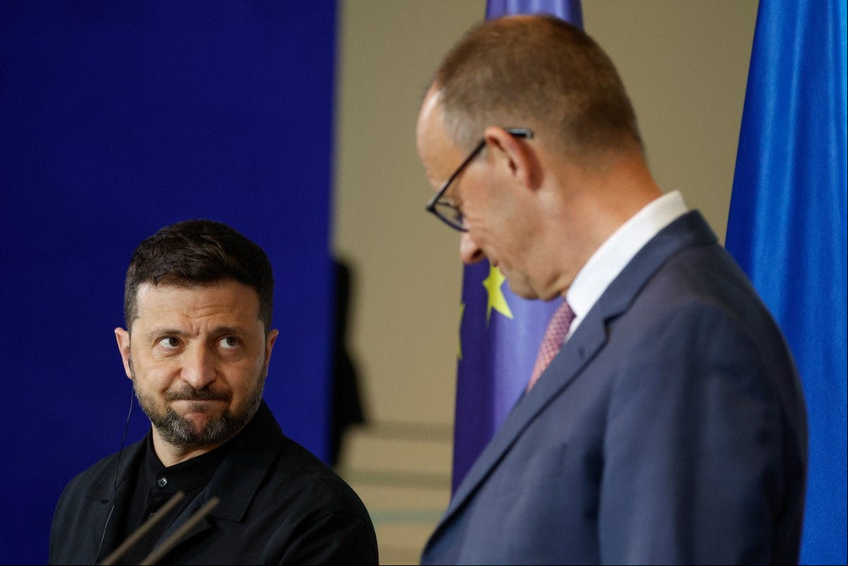 German Chancellor Friedrich Merz and Ukrainian President Volodymyr Zelensky give a t press conference at the Chancellery in Berlin on May 28, 2025. (Photo by Odd ANDERSEN / AFP)